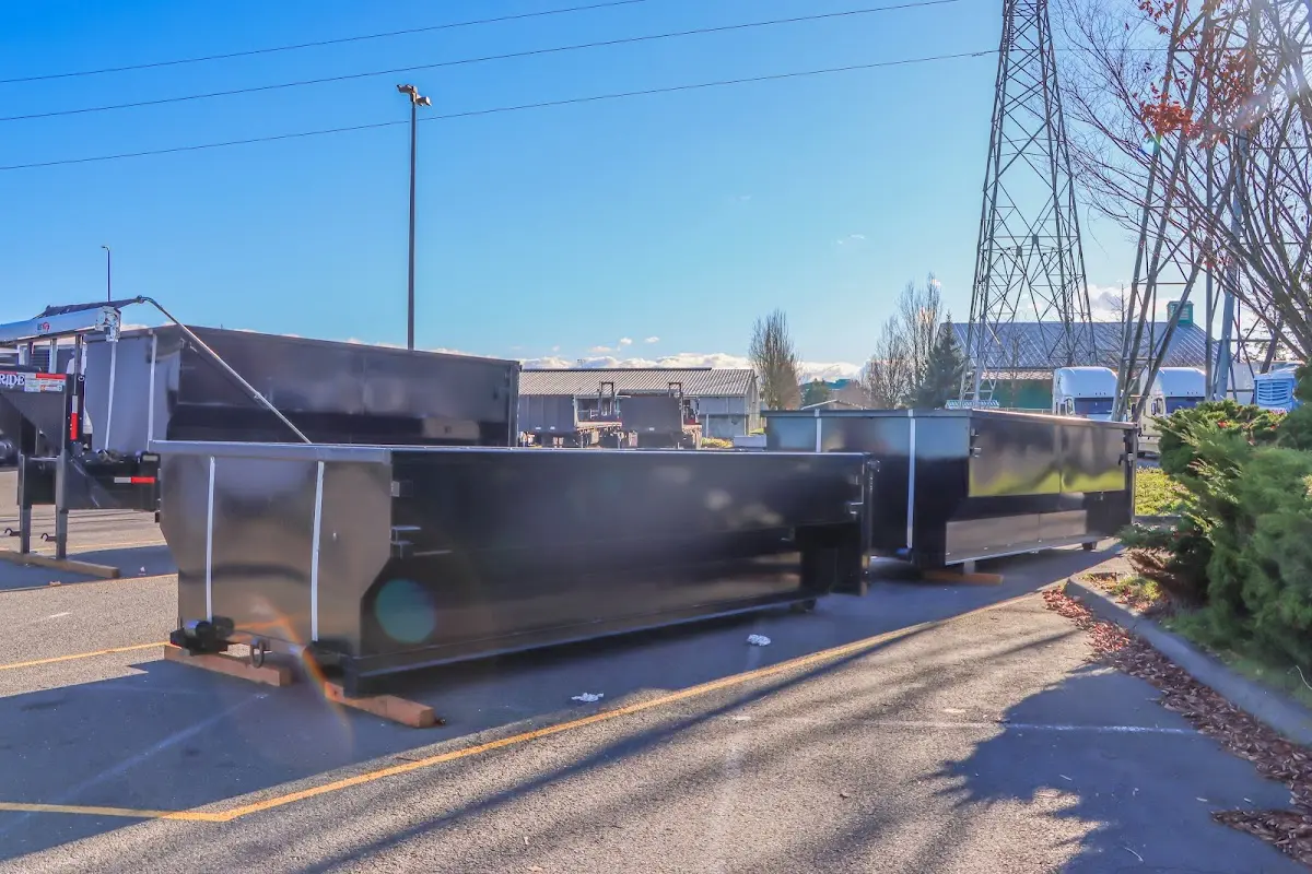 Roll-off dumpster ready for waste disposal at job site for Yard Waste Dumpster Rental in Clarksville